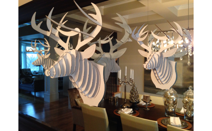 white stag heads with light